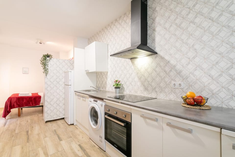 Kitchen or kitchenette, washing machine