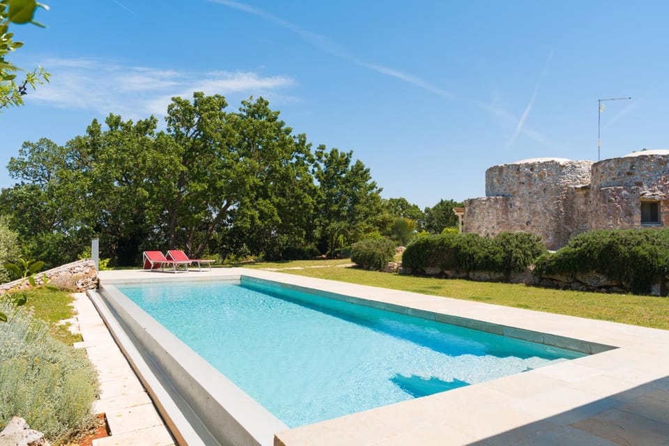 Property building, Living room, Swimming pool