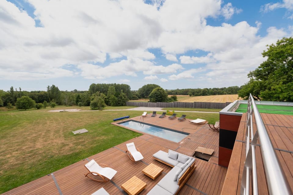 Property building, Living room, Swimming pool