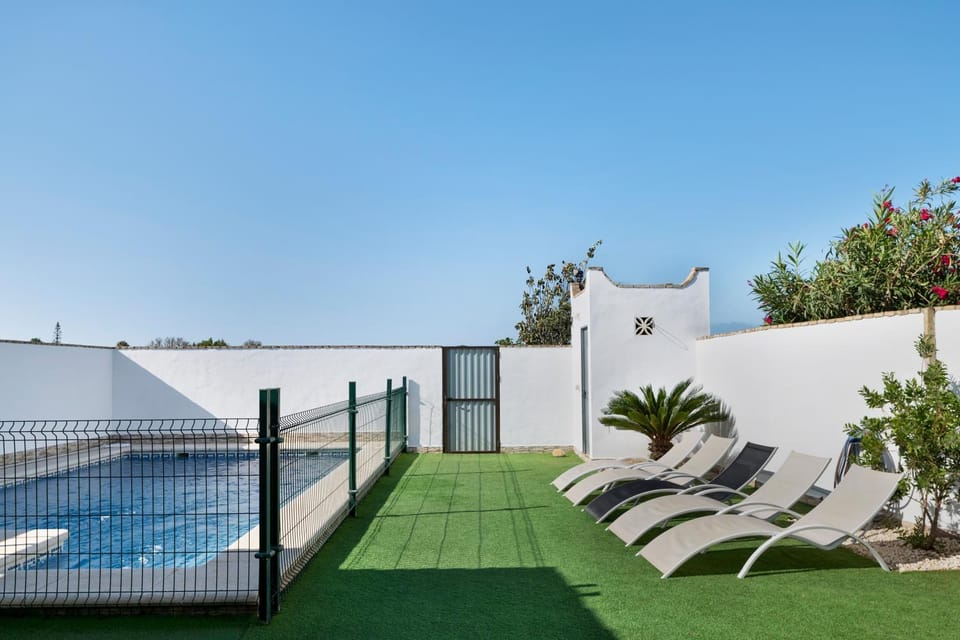Property building, Living room, Swimming pool