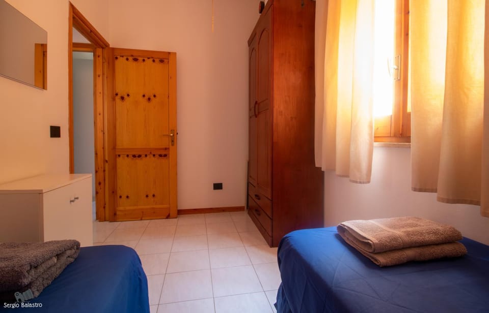 Bed, Photo of the whole room, Bedroom, towels, wardrobe