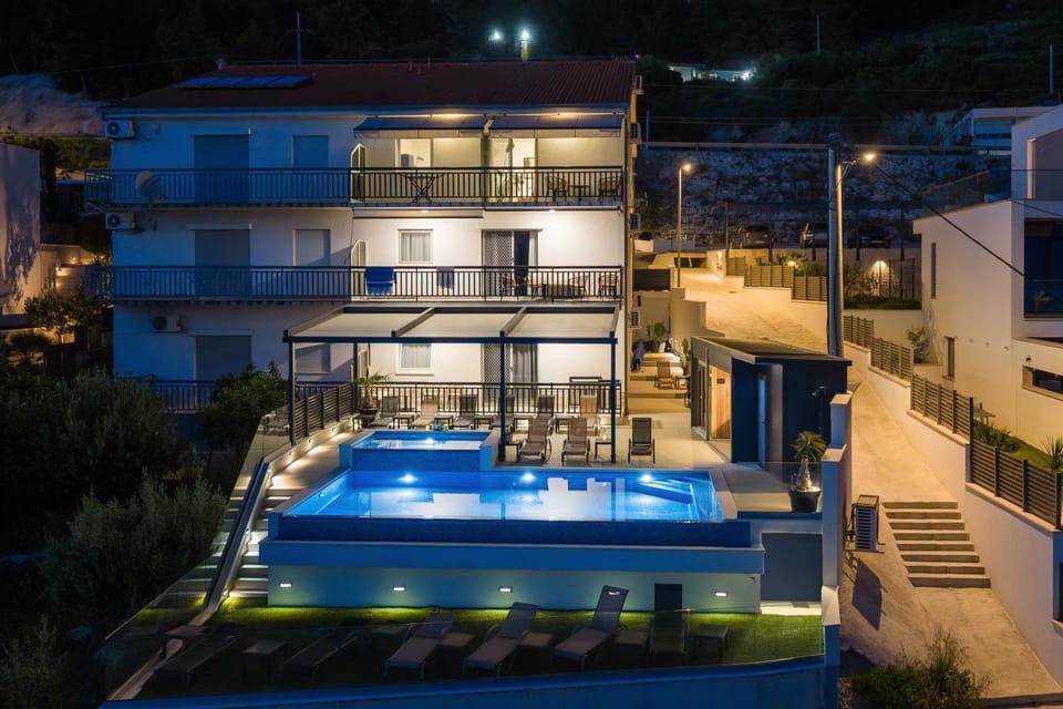Property building, Night, Pool view, Swimming pool