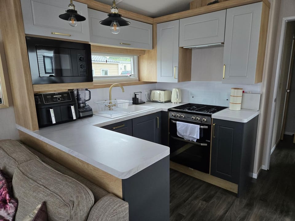 Kitchen or kitchenette, oven, stove, toaster