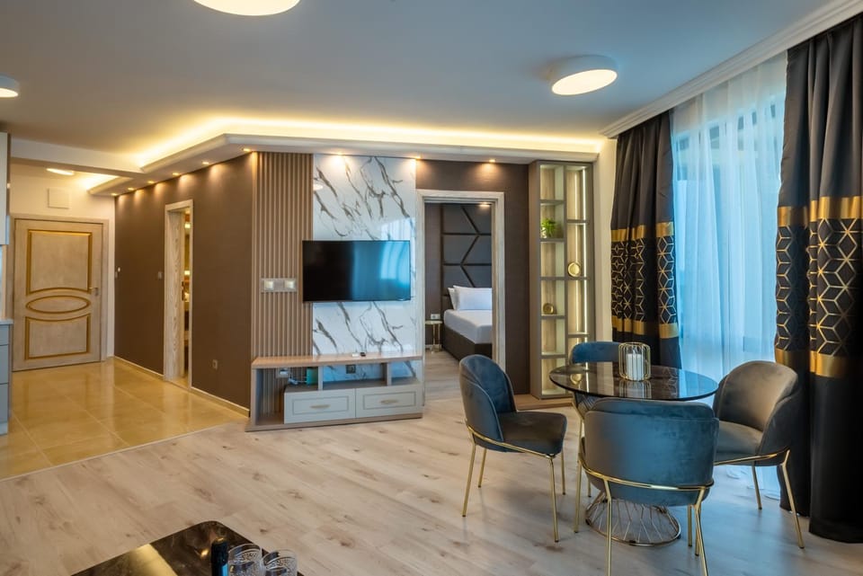 TV and multimedia, View (from property/room), Living room, Seating area, Sea view, Family