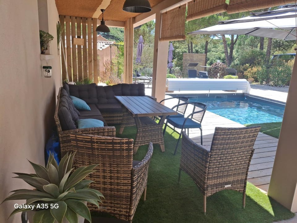Patio, Day, Living room, Seating area, Pool view, Swimming pool, sunbed