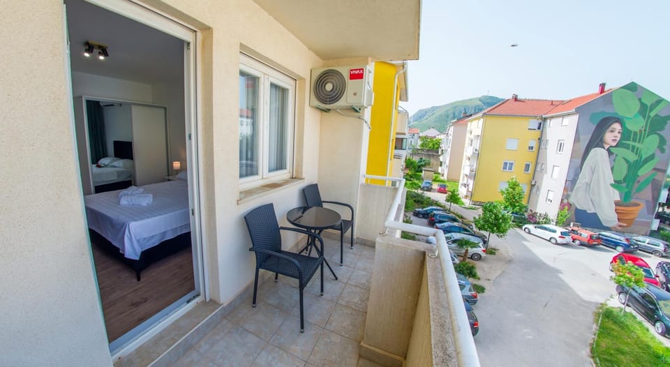 Property building, View (from property/room), Balcony/Terrace, Seating area