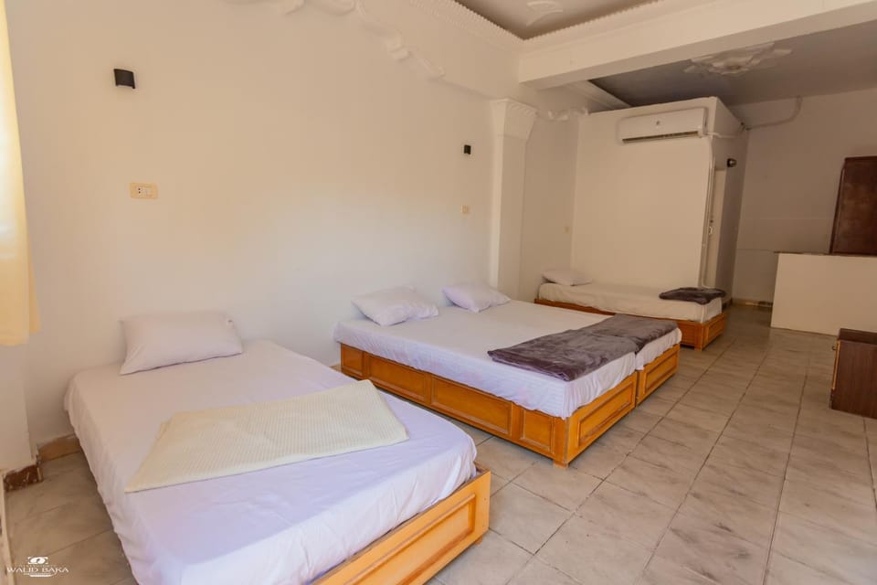 Bed, Photo of the whole room, Bedroom, towels, air conditioner