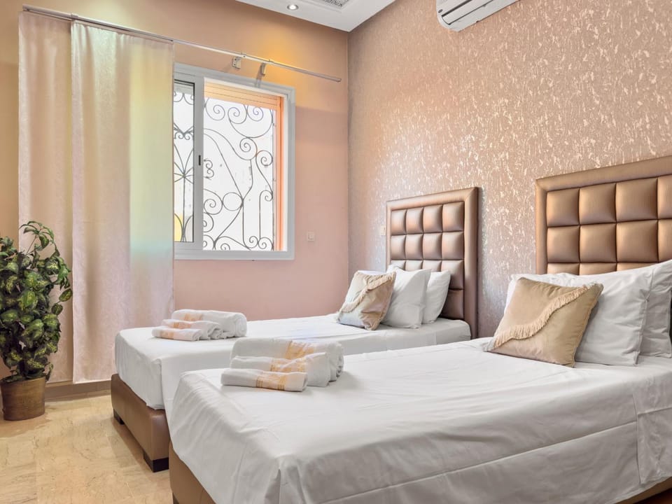 Bed, Photo of the whole room, Bedroom, towels, air conditioner