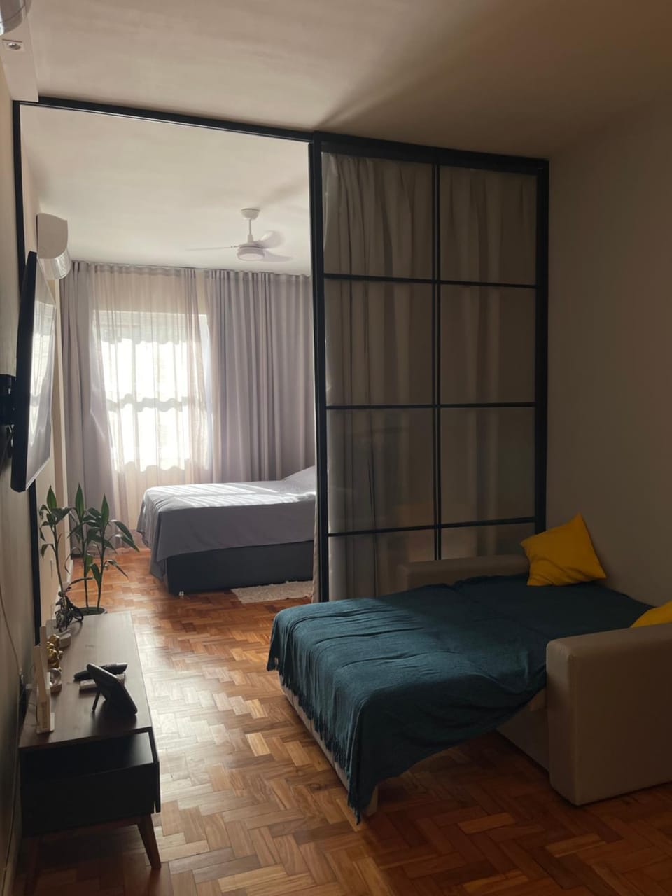 Bed, Living room, Seating area, Bedroom