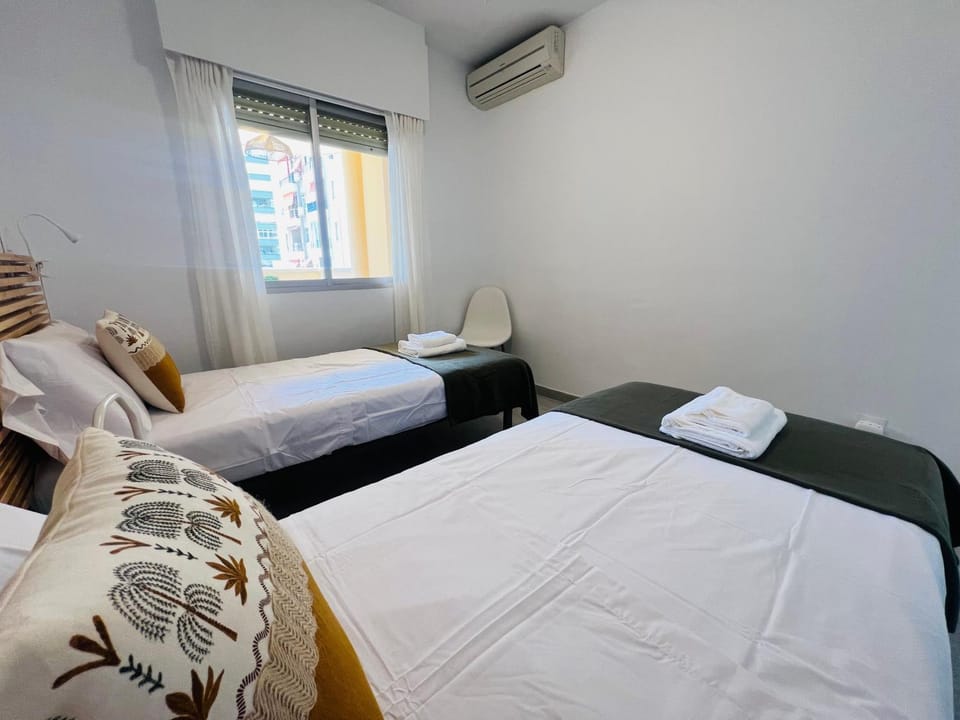 Bed, Photo of the whole room, Bedroom, towels, air conditioner
