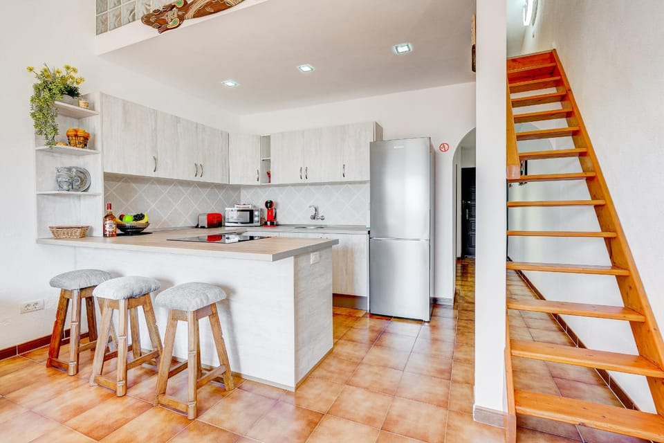 Kitchen or kitchenette, stove, toaster