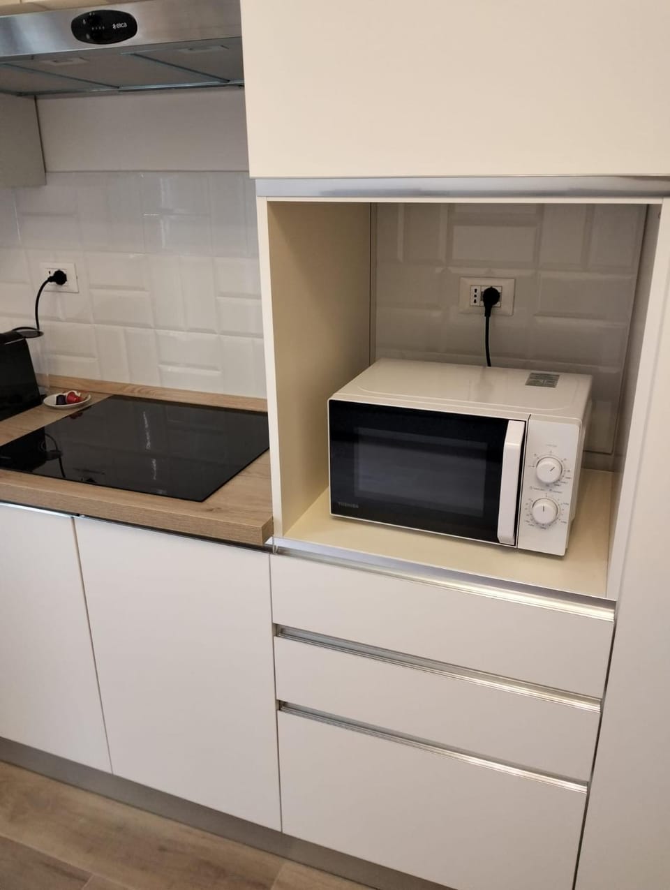 Kitchen or kitchenette, microwave