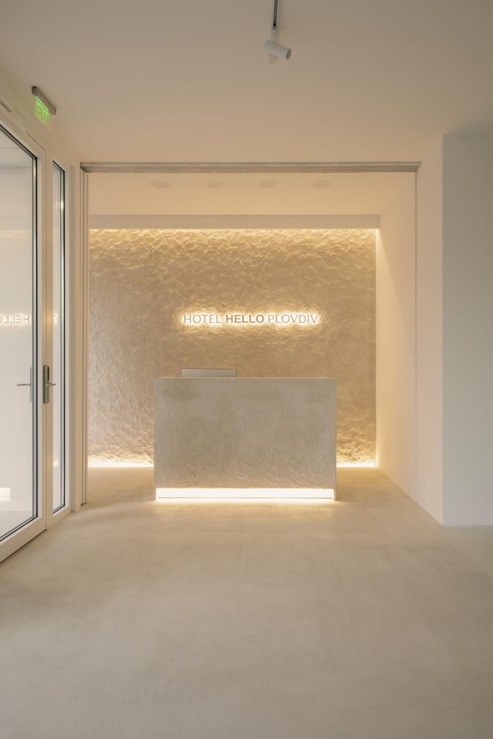 Property building, Facade/entrance, Lobby or reception, Text overlay, Text overlay