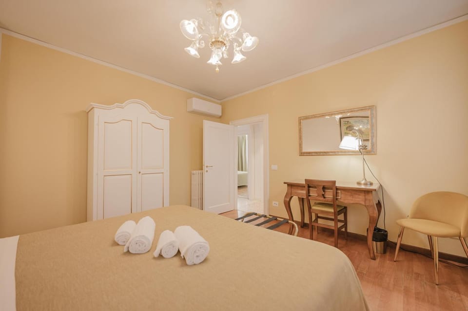 Bed, Photo of the whole room, Bedroom, towels, air conditioner