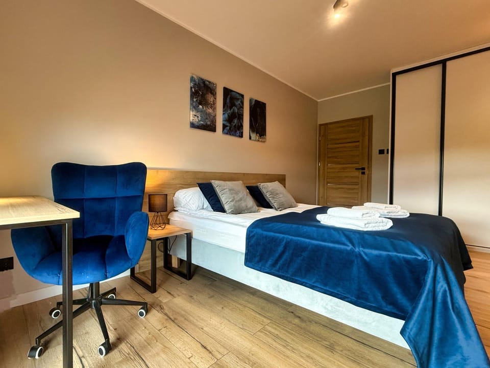 Photo of the whole room, Seating area, Bedroom, towels, wardrobe