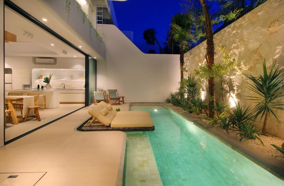 Patio, Night, Seating area, Pool view, Swimming pool, sunbed