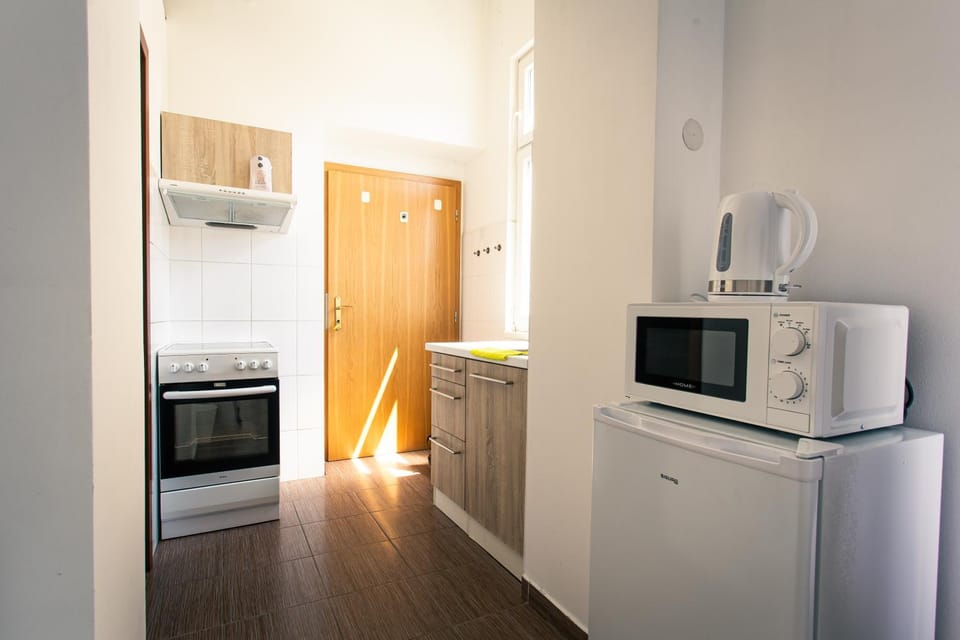 Kitchen or kitchenette, oven, stove