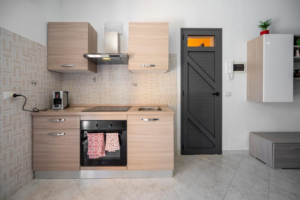 Kitchen or kitchenette, oven, stove