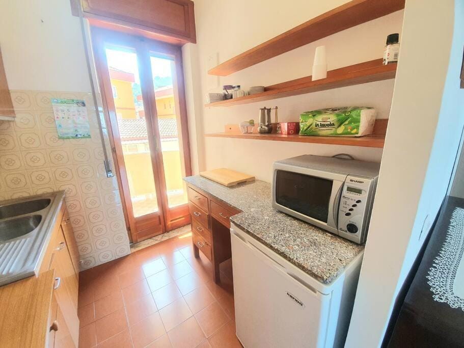 Kitchen or kitchenette, oven, stove