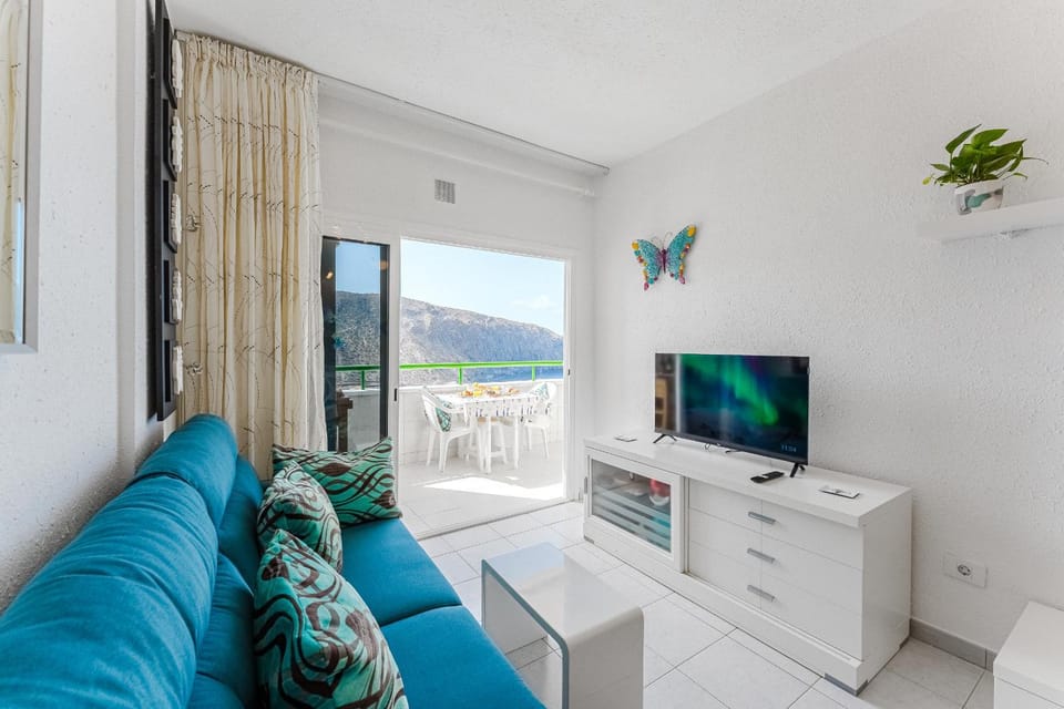 TV and multimedia, Living room, Seating area, Mountain view, Sea view