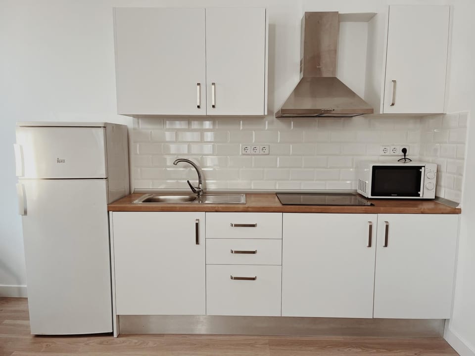 Kitchen or kitchenette, stove