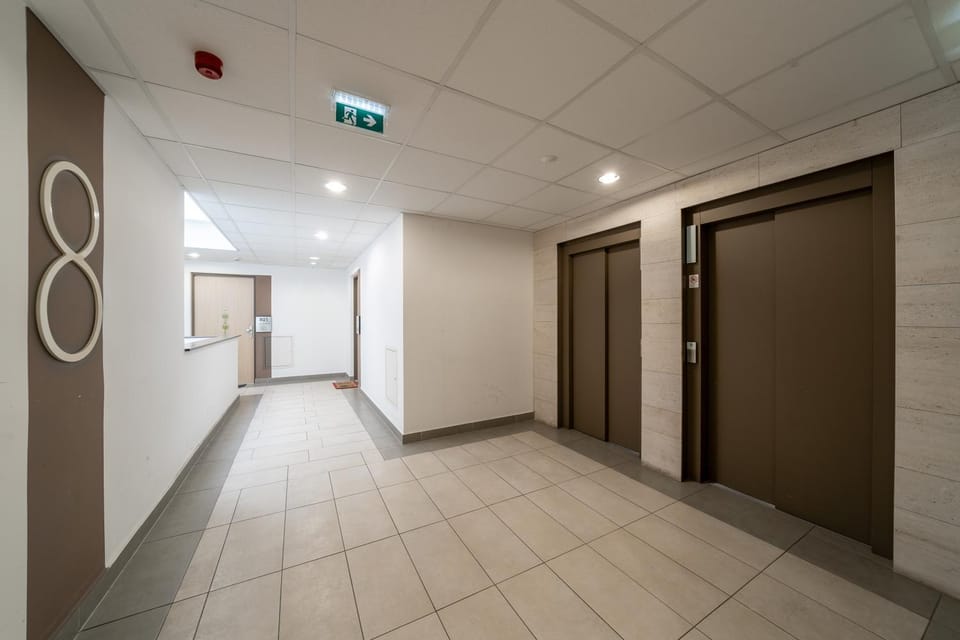 Property building, elevator