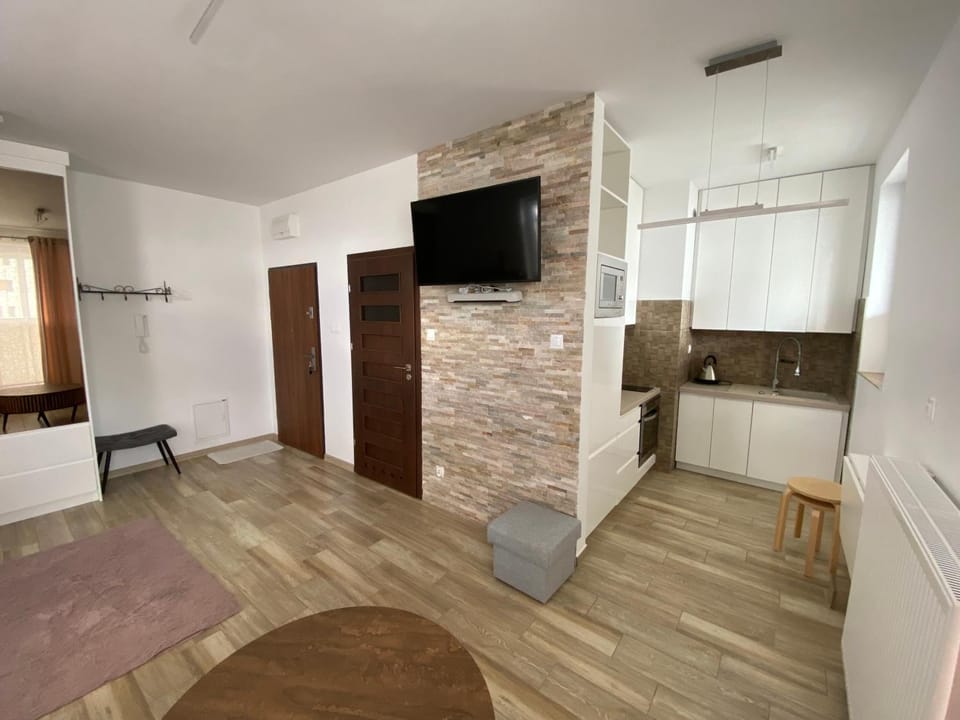 Przytulna kawalerka na Morenowej Apartment in Poland