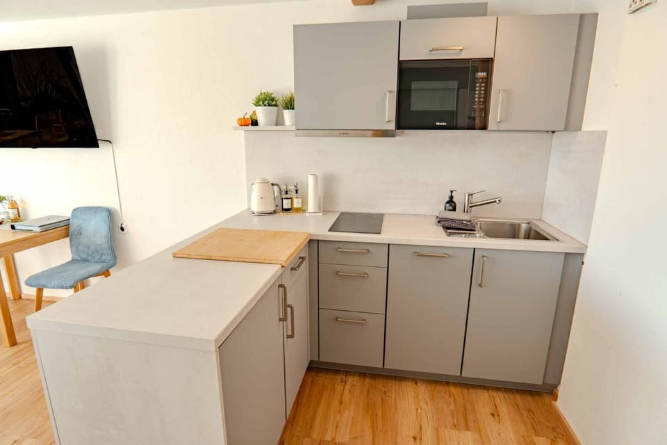 Kitchen or kitchenette, stove, kitchen