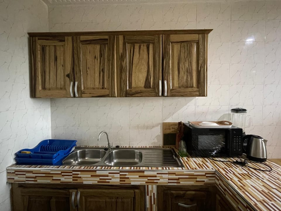 Kitchen or kitchenette, stove, toaster