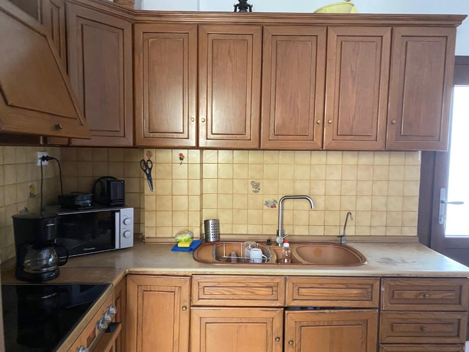 Kitchen or kitchenette, stove