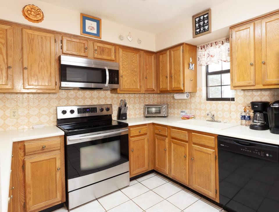 Kitchen or kitchenette, microwave, oven, stove, toaster, kitchen