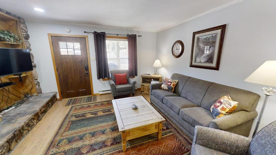 TV and multimedia, Living room, Seating area, fireplace, furniture, air conditioner