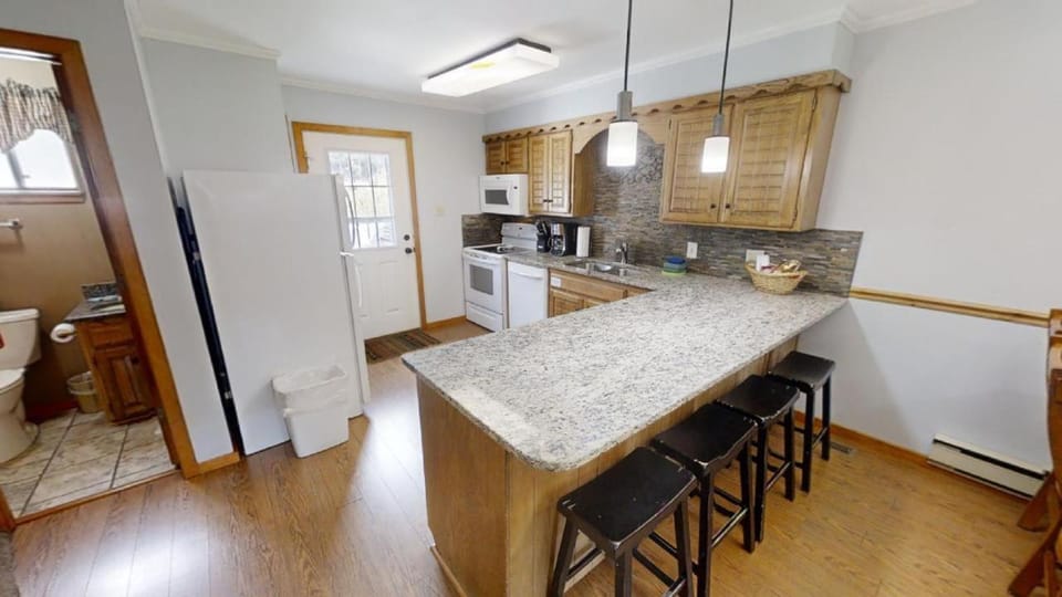 Kitchen or kitchenette, furniture, microwave, oven, stove, kitchen