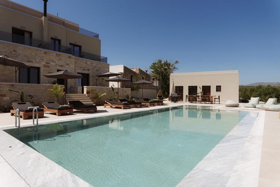 Property building, Patio, Pool view, Swimming pool, sunbed