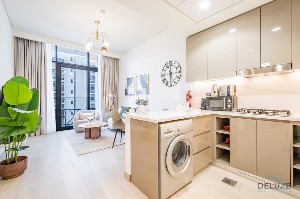 Kitchen or kitchenette, stove, washing machine