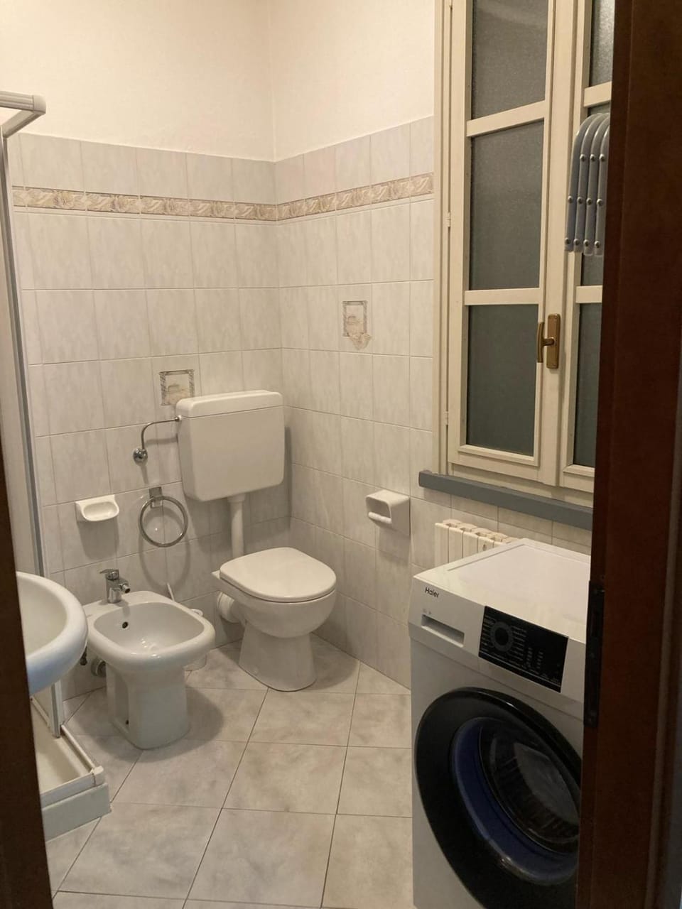 Bathroom, bidet, washing machine