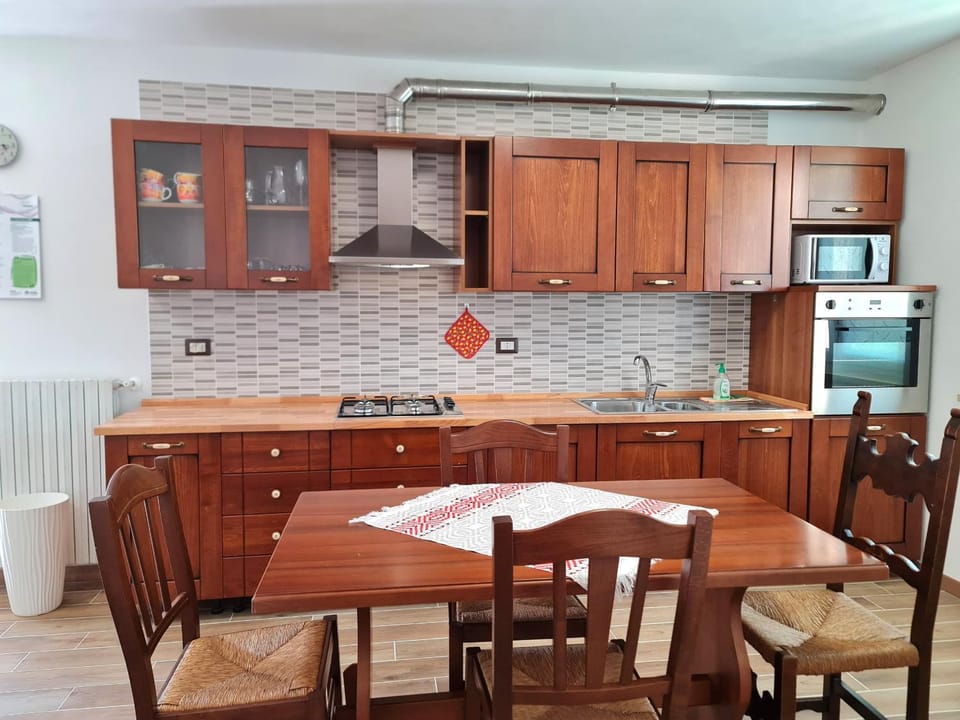 Kitchen or kitchenette, oven, stove