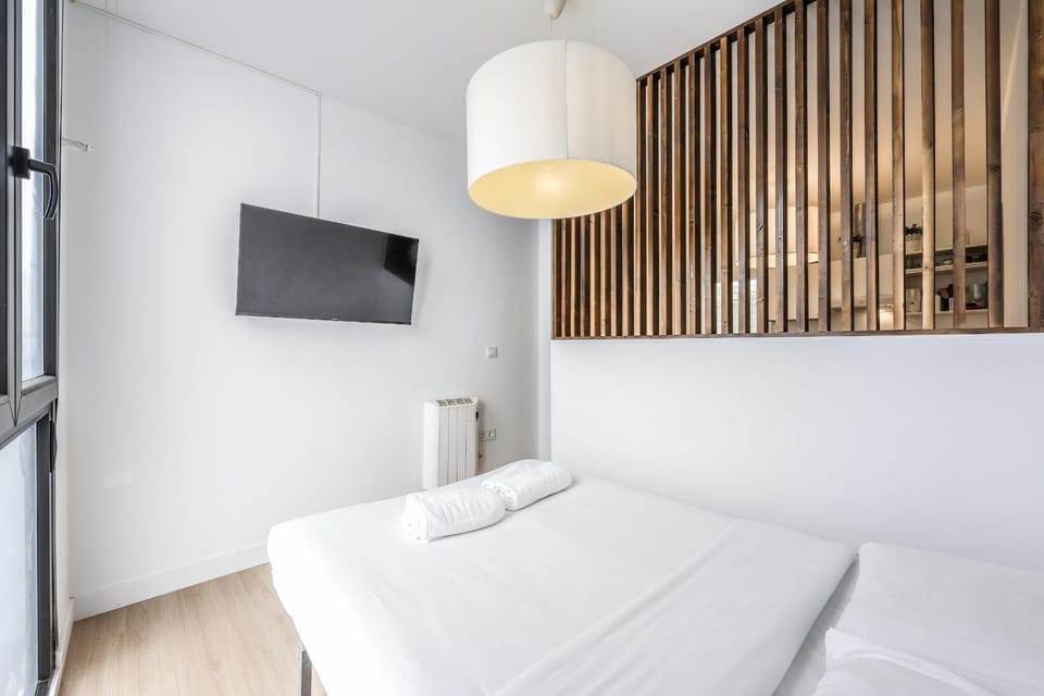 pequeno apartamento reformado en tirso de molina ALQUILER TEMPORAL Apartment in Centro