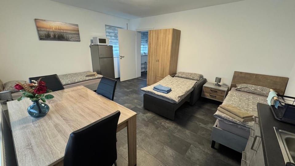 Bed, Living room, Seating area, Bedroom