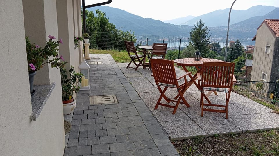 Property building, Patio, Natural landscape, View (from property/room), Balcony/Terrace, Dining area, Mountain view