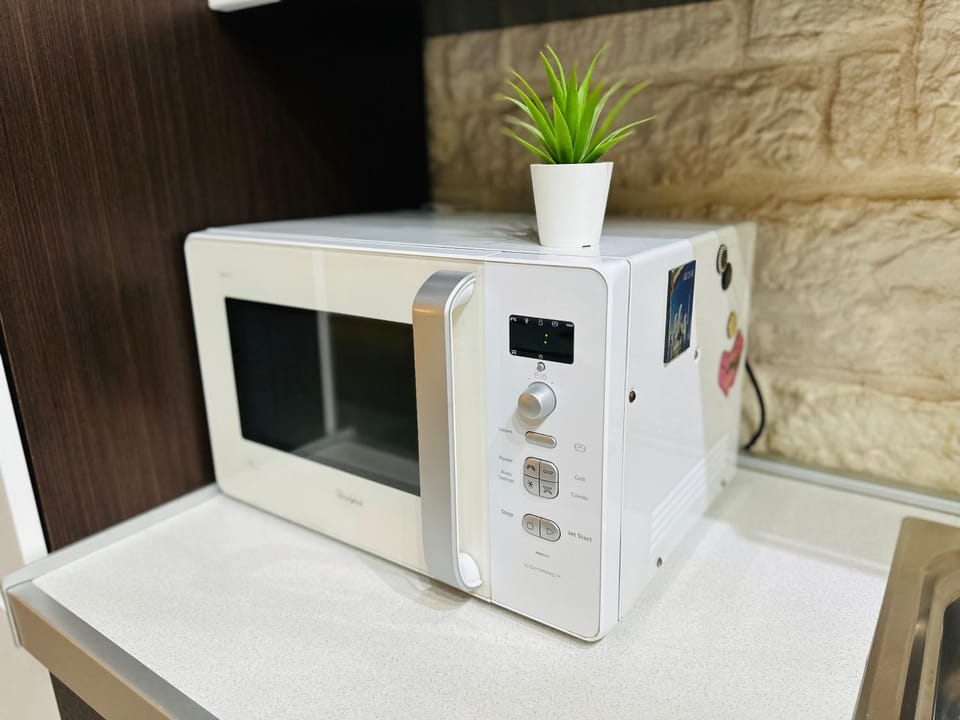 Kitchen or kitchenette, microwave