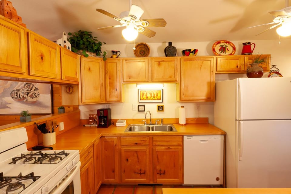 Kitchen or kitchenette, dishwasher, microwave, oven, stove, kitchen