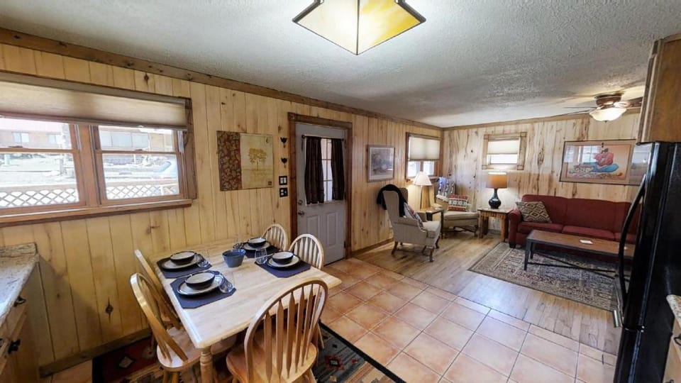 Day, TV and multimedia, Living room, Seating area, Dining area, furniture, wardrobe, air conditioner