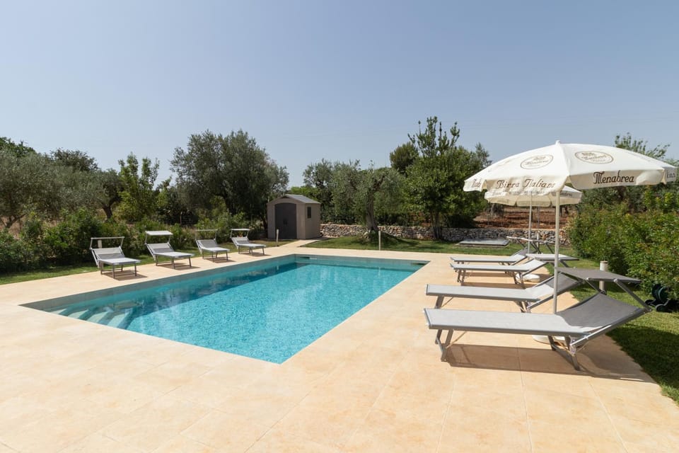 Property building, Living room, Swimming pool