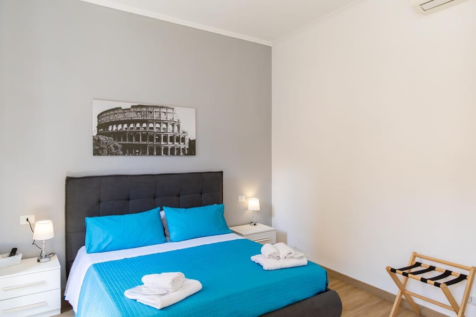 Bed, Photo of the whole room, Bedroom, towels, air conditioner