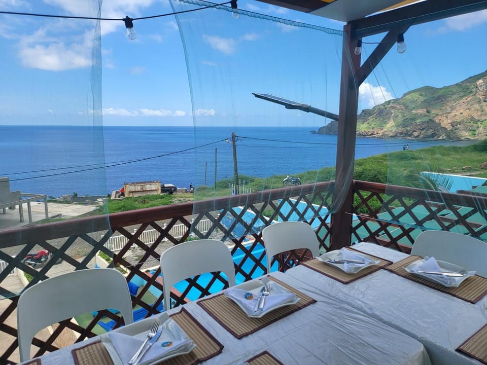 Natural landscape, View (from property/room), Balcony/Terrace, Dining area, Mountain view, Pool view, Sea view