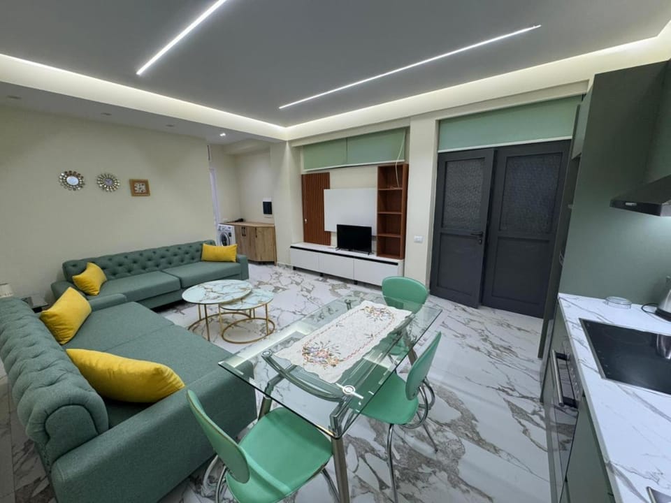 Communal lounge/ TV room, TV and multimedia, Living room, Dining area, oven, stove, washing machine, kitchen