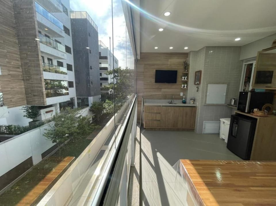 Cód 49 - Apartamento belíssimo com sacada gourmet Apartment in Florianopolis