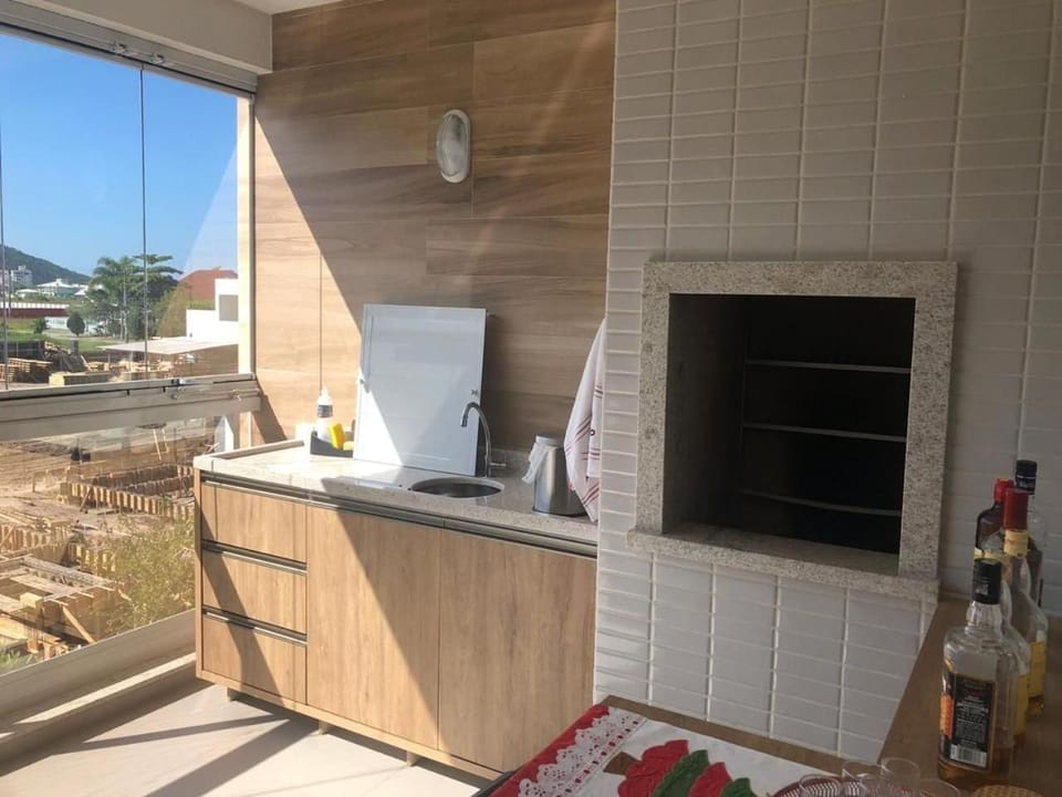 Cód 49 - Apartamento belíssimo com sacada gourmet Apartment in Florianopolis