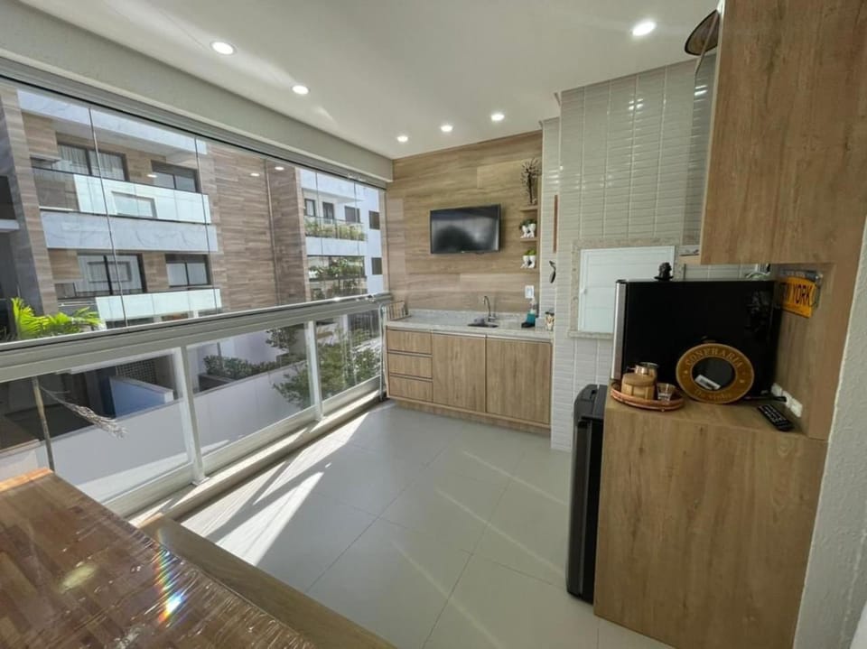 Cód 49 - Apartamento belíssimo com sacada gourmet Apartment in Florianopolis